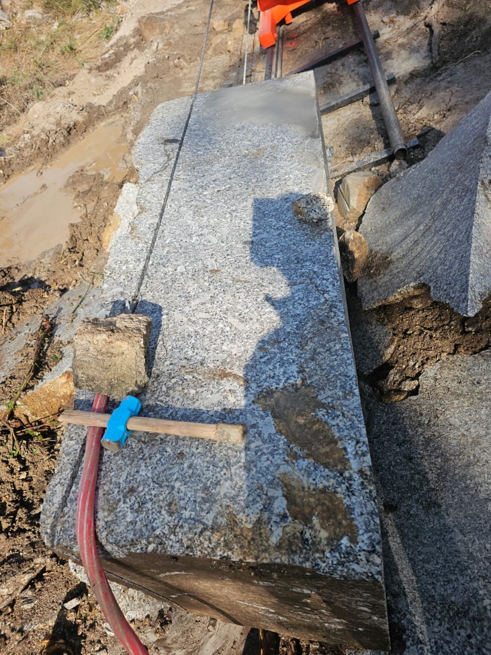 Granite block and extraction tools on site