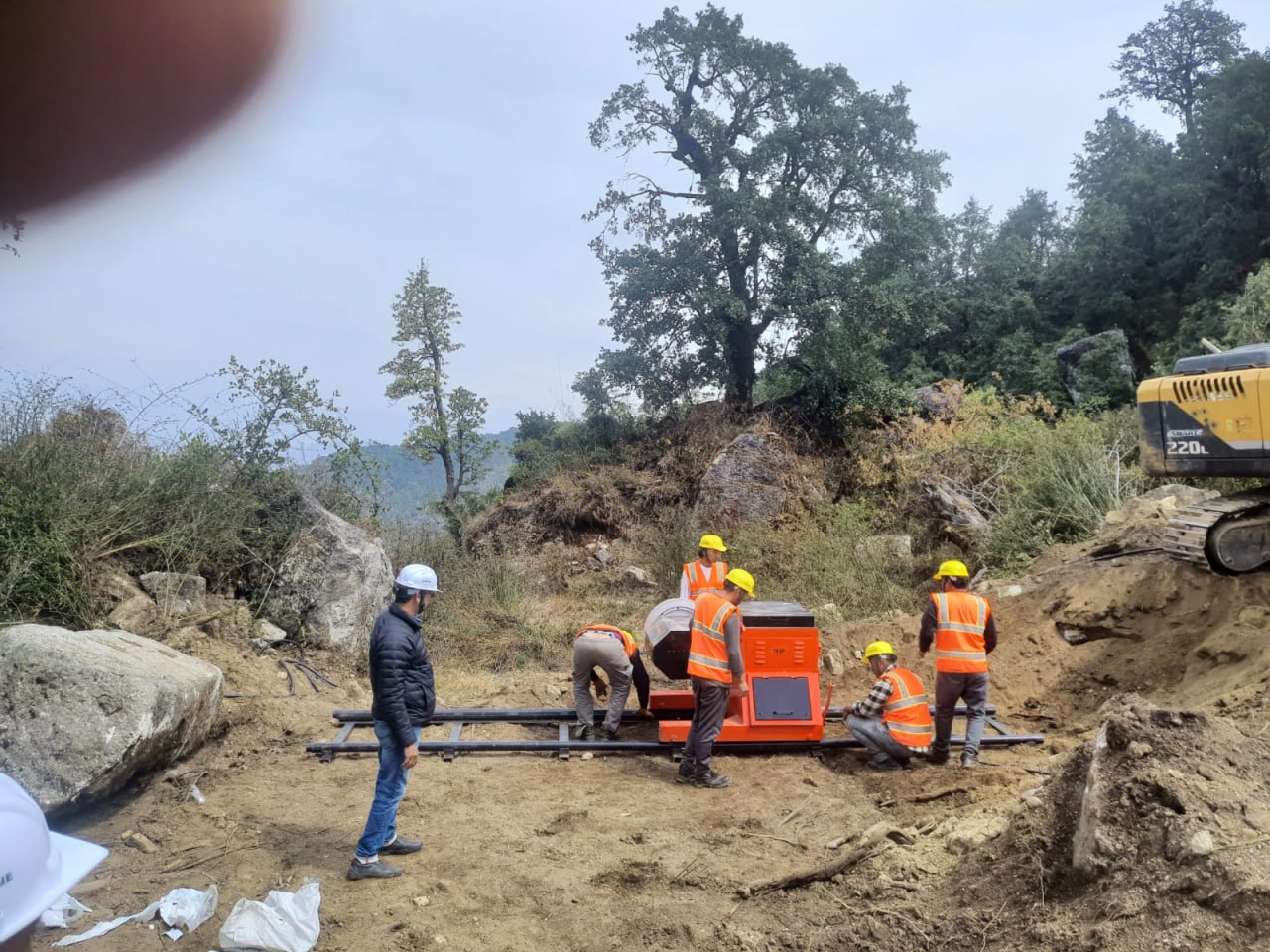 Machine setup and crew working at the Kailash site