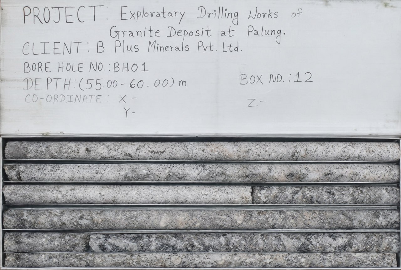 Granite drill core samples with a board labelled Palung, borehole BH01, depth 55–60 metres